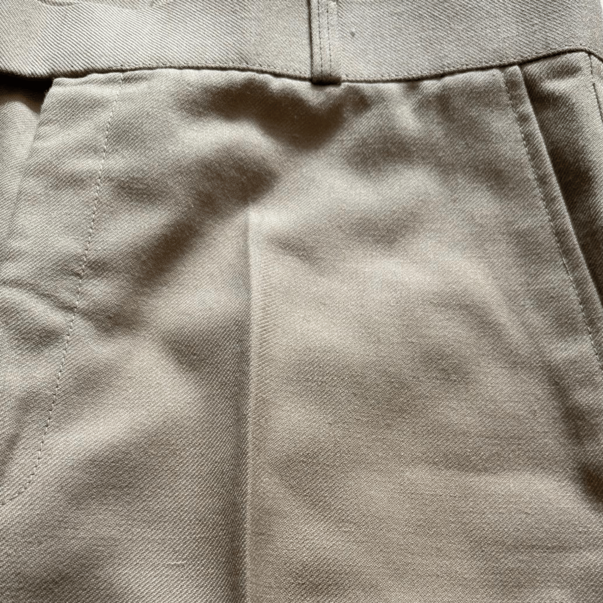 Beige women's elegant high-waisted trousers with straight legs - a classic cut