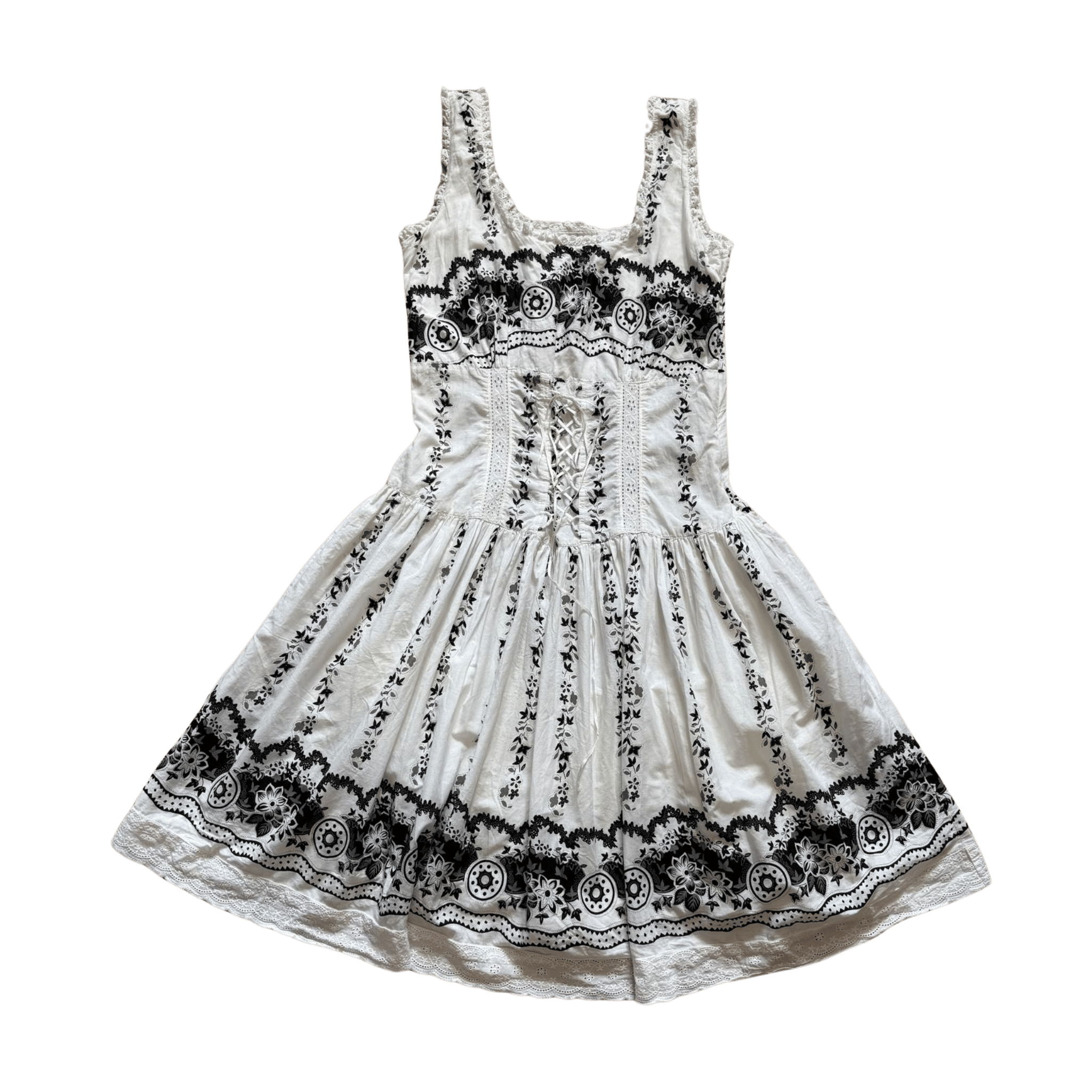 White cotton mini dress with straps and a black print