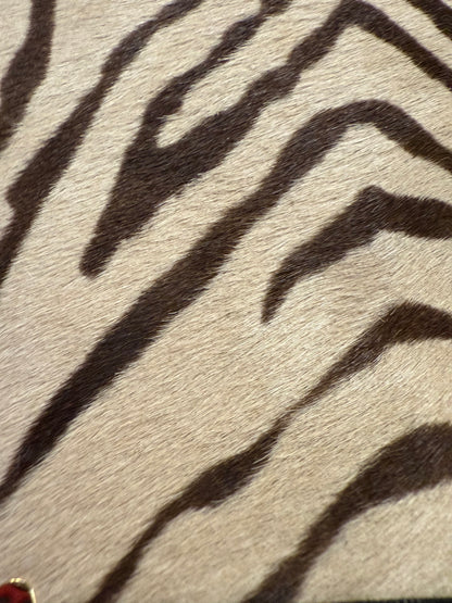 Mała skórzana torebka na łańcuszku