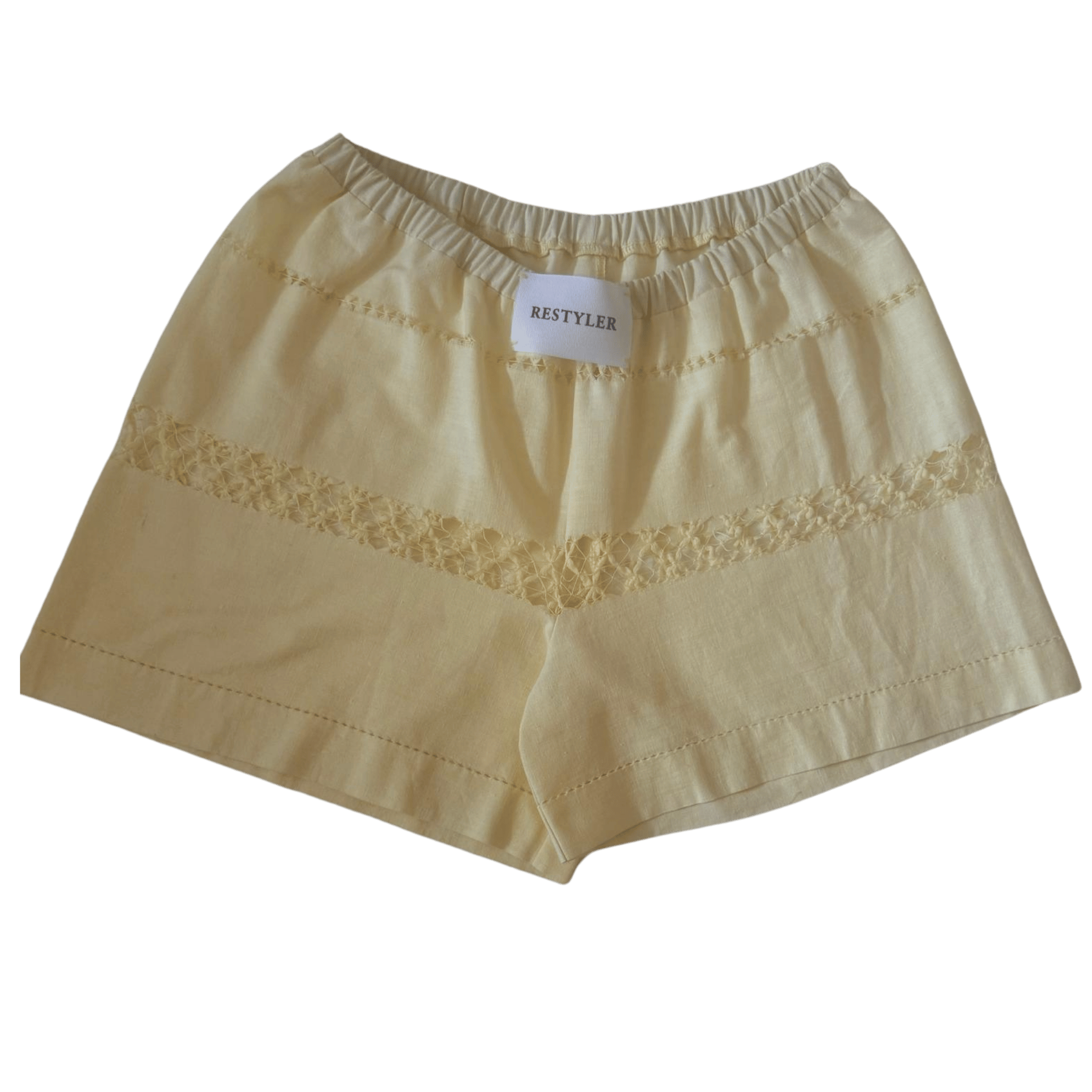 Upcycled women's shorts made from a pastel yellow cotton tablecloth - RESTYLER