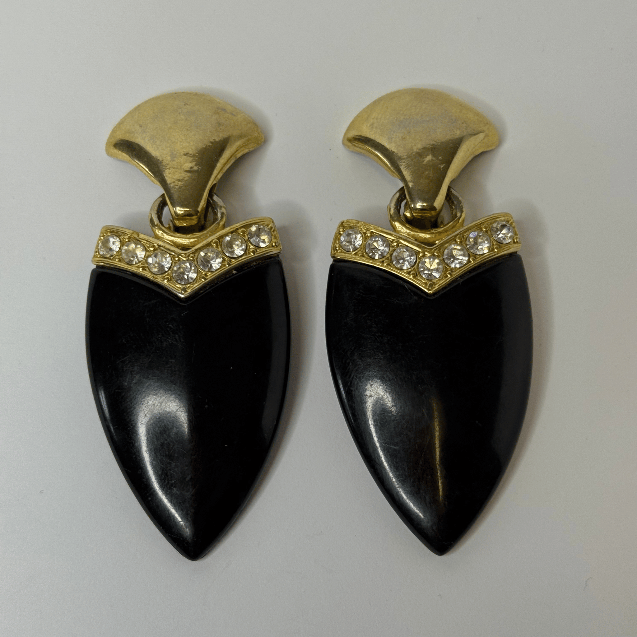 Black and gold vintage clip earrings with crystals – 80s geometric glam.