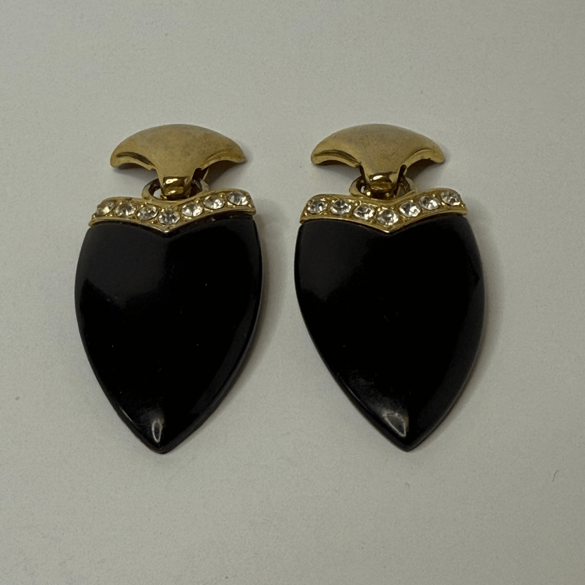 Black and gold vintage clip earrings with crystals – 80s geometric glam.