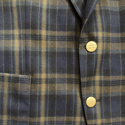 Vintage tartan jacket with gold buttons – old money tailoring with a raw twist